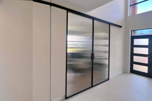 narrow-reeded-glass-soft-stop-sliding-door