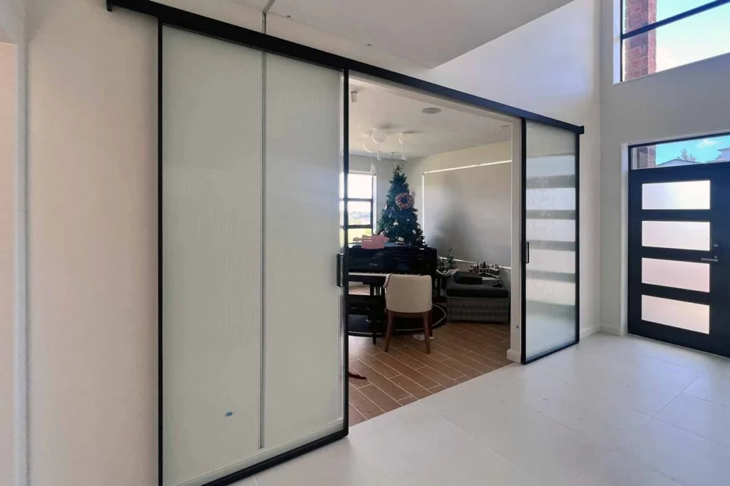 narrow-reeded-glass-stacking-door