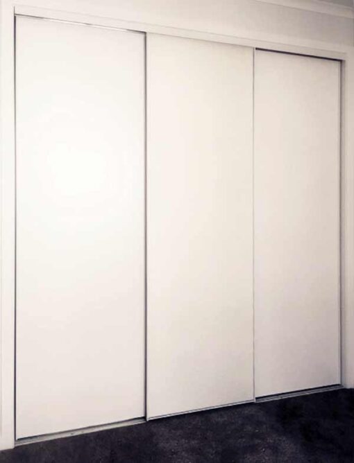 Three-white-melamine-sliding-door-with-triple-tracks